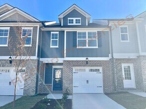 Building Photo - Move In by April 30 & Save $200/Month! Townhome Only $1,695! Regular $1,950 — Available NOW