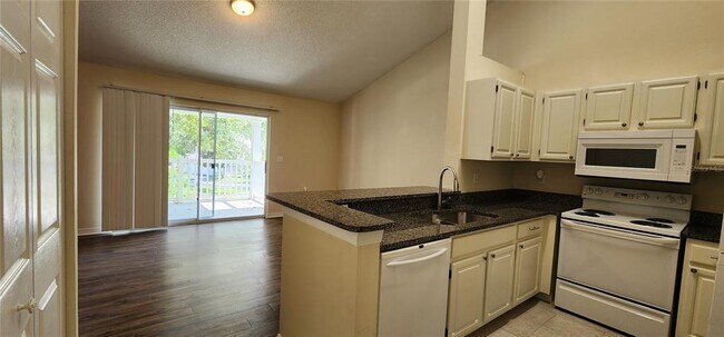 Building Photo - 10000 SW 52nd Ave