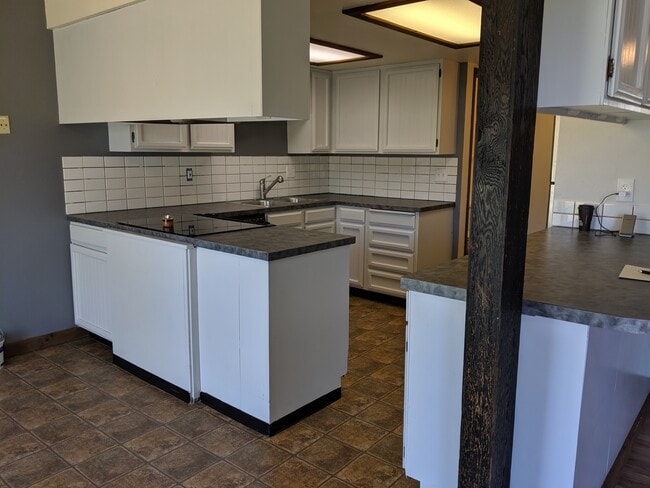 Looking into the kitchen from the living room. - 2115 Pleasanton St