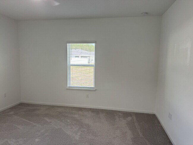 Building Photo - "Spacious 4-Bed Oasis with Granite Finishes & Guest Suite in Jacksonville!"