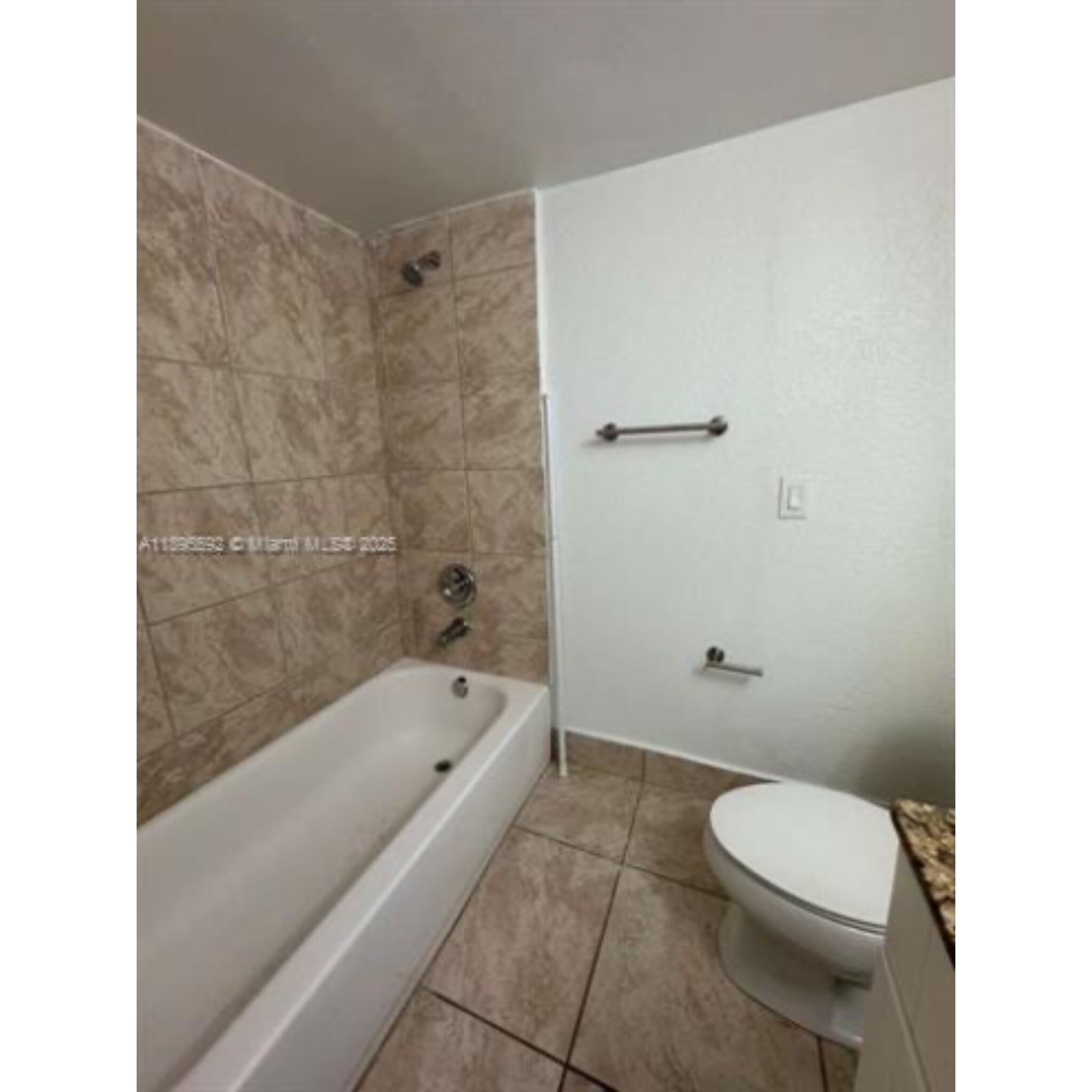 Building Photo - 4235 N University Dr