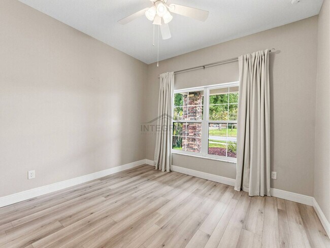 Building Photo - 8947 Garden Party Dr