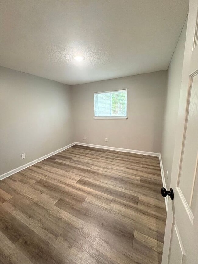 Building Photo - Steps from UofM & Highland Strip – First-Floor 2BR Apartment at The Den!