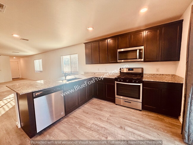 Building Photo - 12867 N Peony Dr