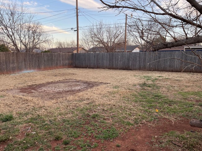 Building Photo - UP-dated 3/2 with carport! NEW HVAC in Jun...
