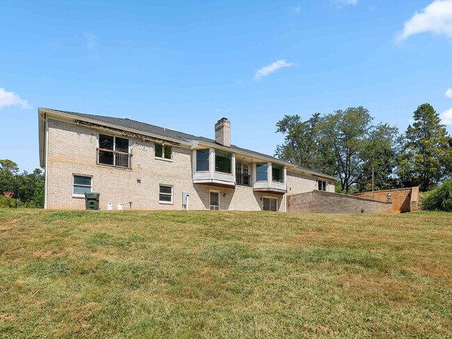 Building Photo - Stunning Oakton Retreat on a Sprawling 5-A...