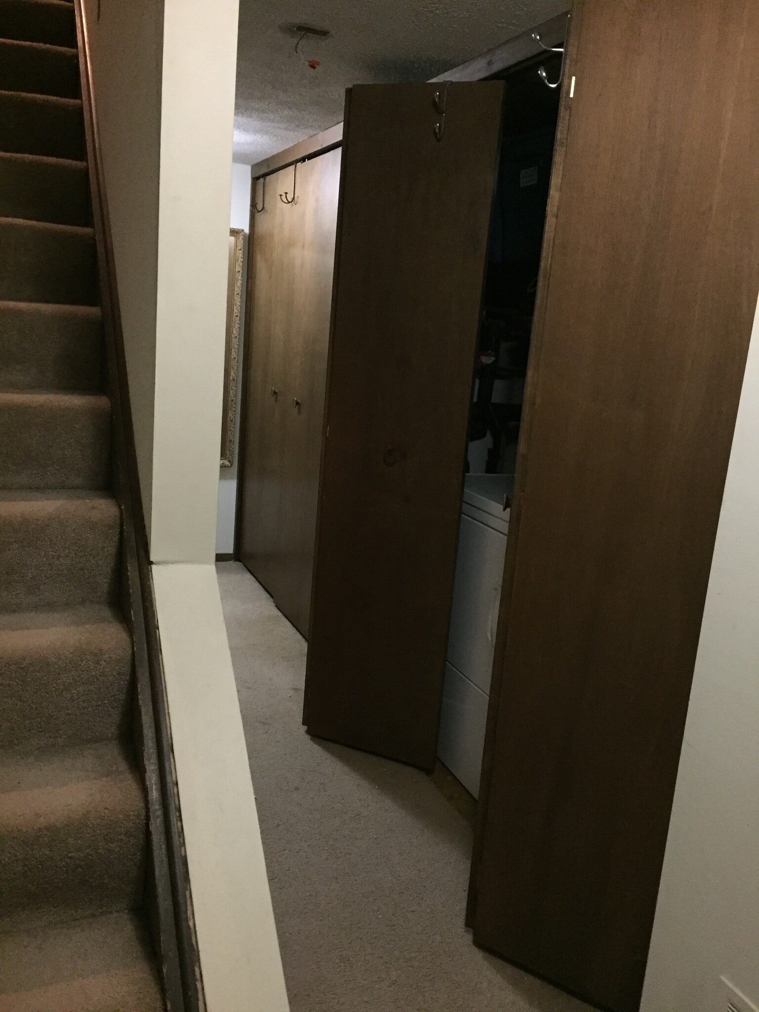 washer and dryer in utility area by hall - 6344 Aurelia St