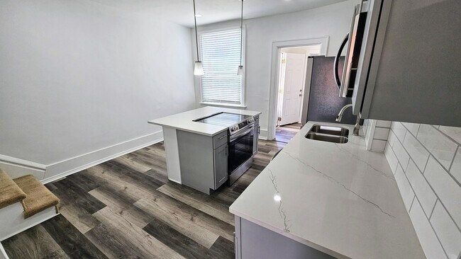 Building Photo - Stunning Renovation with Granite Countertops!