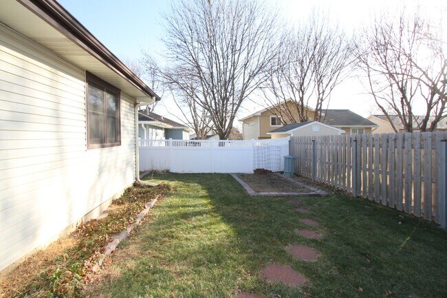 Building Photo - 2+ Bedroom Ranch Home with Finished Basement, Fenced Yard & Garage- Close to I-80