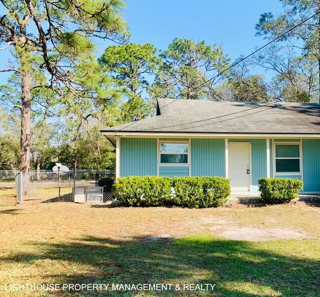 Building Photo - Renovated 2/1 Westside Duplex