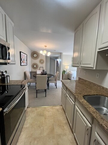 Building Photo - "Chic 2-Bed Condo in Walnut Creek with Sleek Granite Countertops - 790 Sq Ft of Modern Living!"