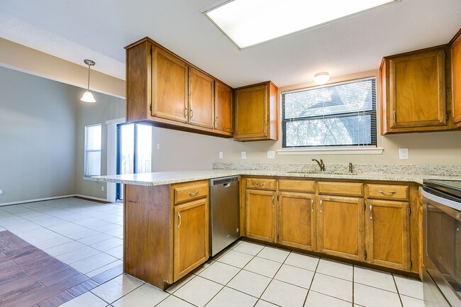 Building Photo - COMING JANUARY 2026 - Spacious 2-Bedroom Townhome with River View!