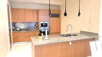 Building Photo - 15811 Collins Ave