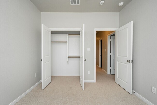 Building Photo - Spacious Townhome Available Now!