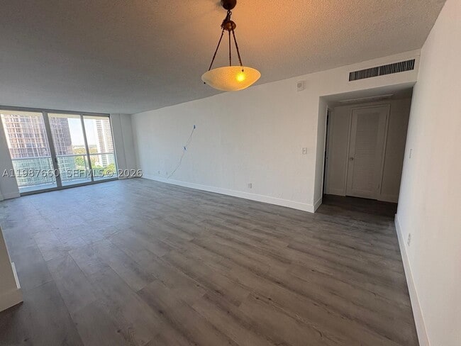 Building Photo - 19390 Collins Ave