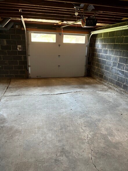 GARAGE IN BASEMENT - 702 Pearl Dr