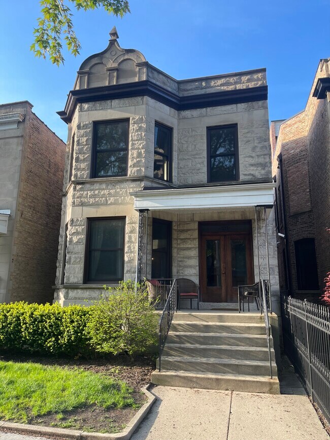 Front exterior, apt on second floor - 1211 W Newport Ave