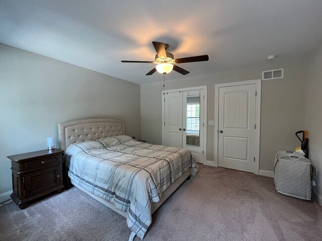 Building Photo - Exceptional 4BD, 2.5BA Cary Townhome with 2-Car Garage, Bonus 2nd Floor Living Space, and Private...