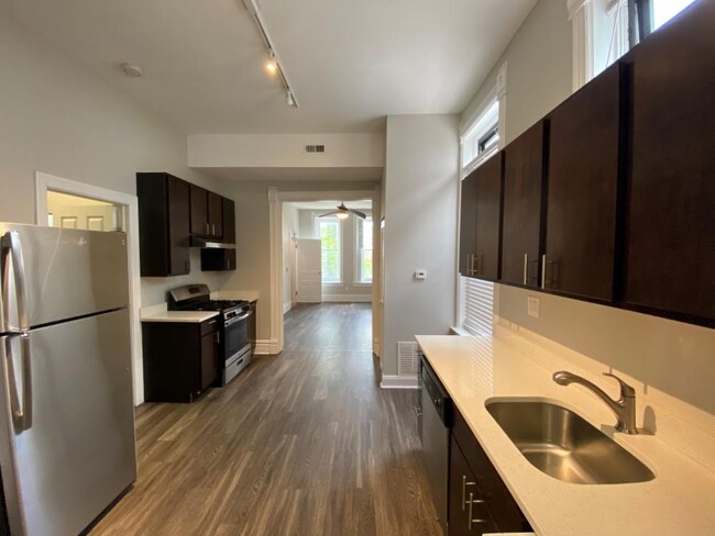 Open layout with sightlines to the living area from the kitchen - 2346 W McLean