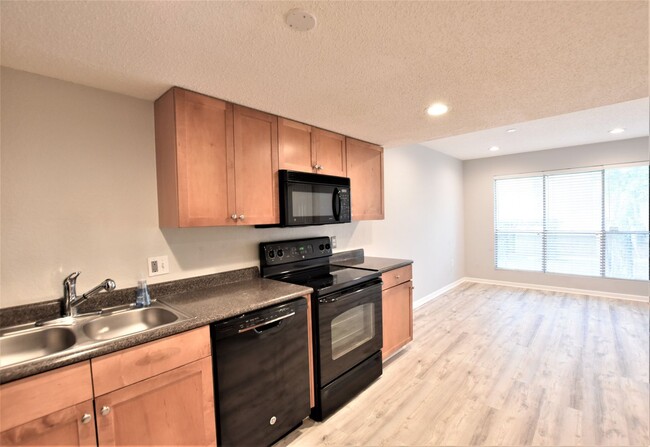 Building Photo - **Spacious 3-Bedroom Condo Available! 50% ...