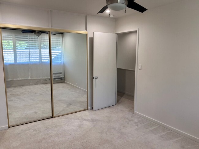 Building Photo - Available Now | 2 Bedroom, 2 Bathroom Townhouse with 1 Assigned Parking Stall at Tropic Gardens 1