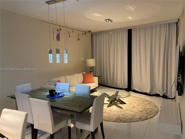 Building Photo - 17121 Collins Ave