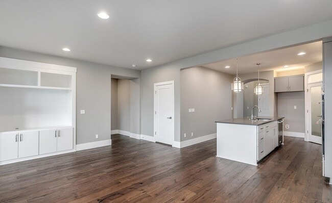 Building Photo - Bethany Stunner - 5 Bedrooms with Main-Level Bed & Bath, Modern Kitchen & Private Fenced Yard