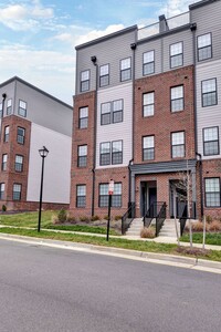 Building Photo - Three Story Brick End Unit with Rooftop Terrace