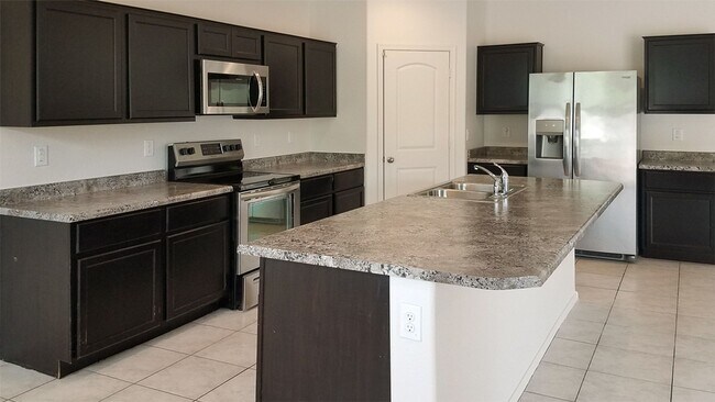 Building Photo - Four Bedroom home for rent in Magma Ranch for under $2000.00