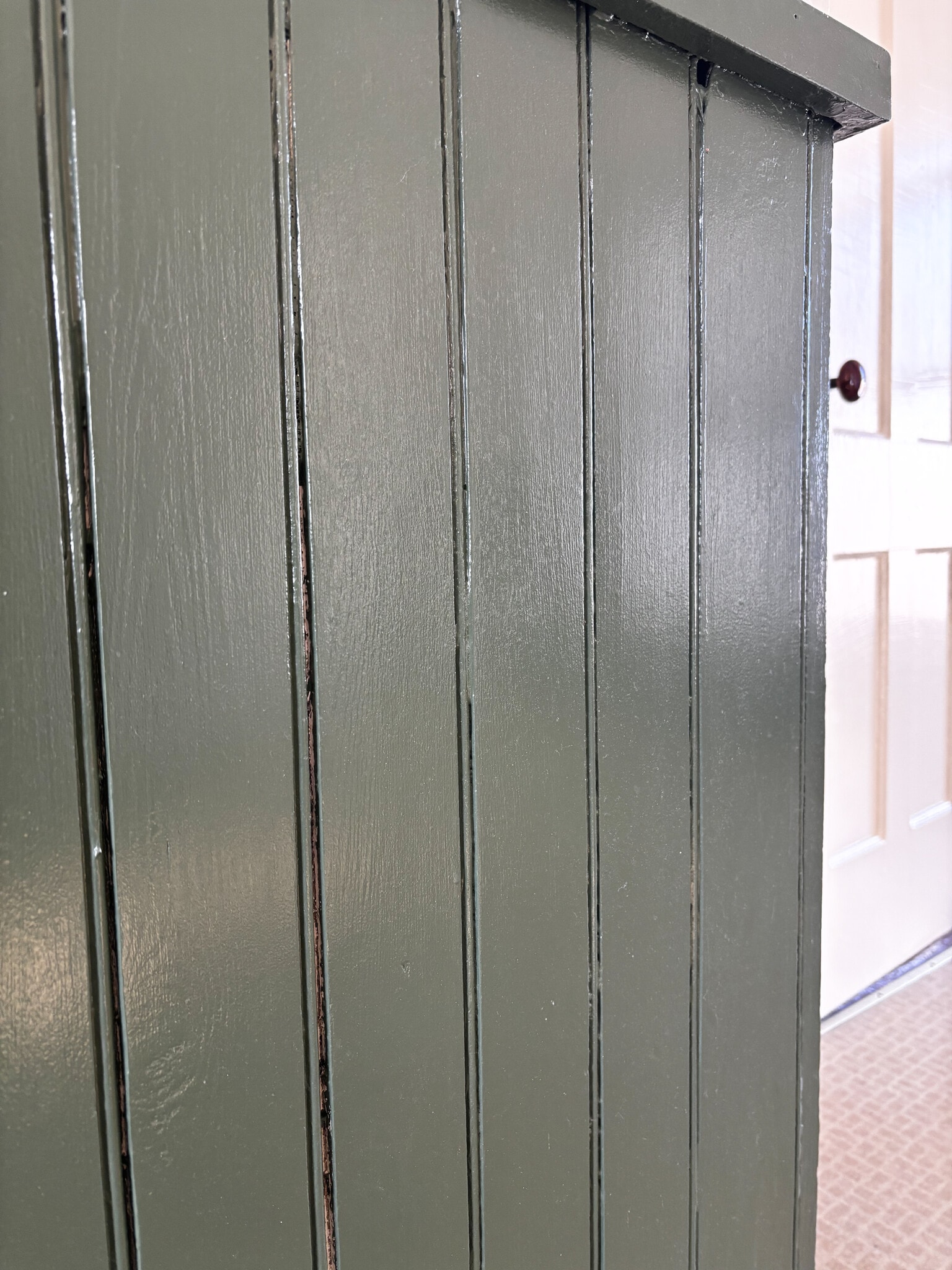 Kitchen cabinets are a relaxing sage green - 50 Grove St