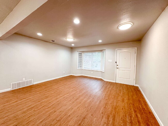 Building Photo - Spacious Living & Modern Upgrades