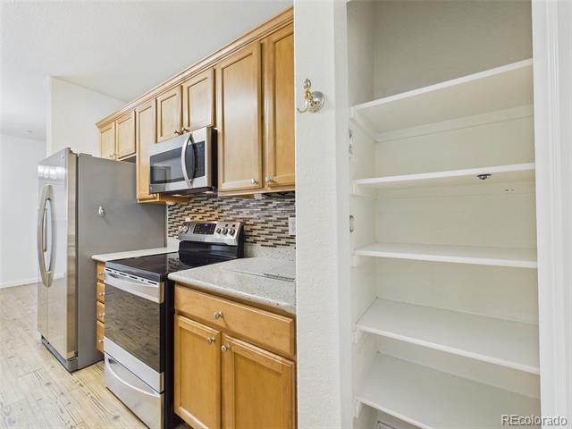 Building Photo - 10239 W 55th Dr