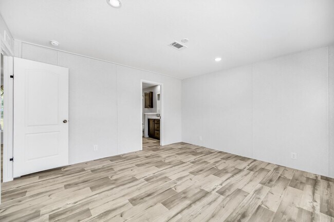Building Photo - Experience exceptional living at its finest