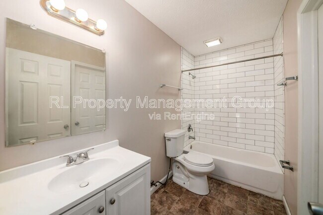 Building Photo - 7179 Feather Ct