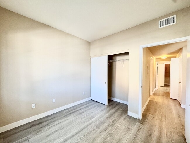 Building Photo - DOWNSTAIRS CONDO | GATED COMMUNITY | CENTENNIAL HILLS | UPDATED 3 BEDROOM