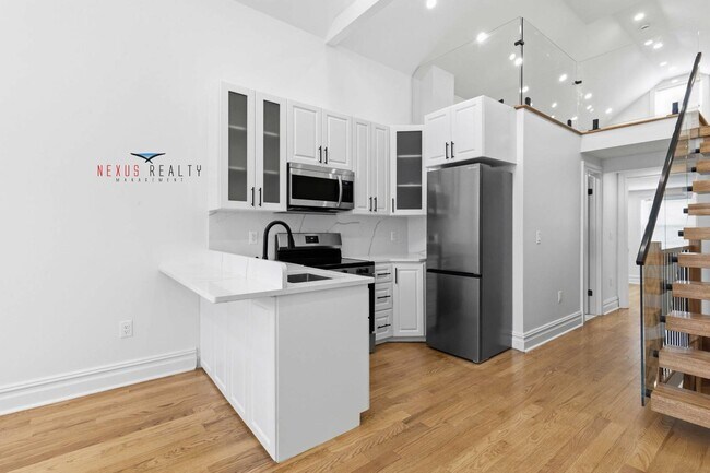 Building Photo - 21-28-28 48th St