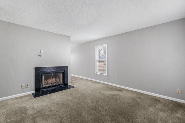 Building Photo - NE Home - Updated Kitchen and Bathrooms!  SS Appliances, Fire Place, Front Porch & Deck, Fenced Y...