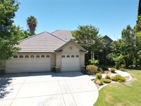 Building Photo - Spacious 4-Bed, 2-Bath Home in Gated Baker...