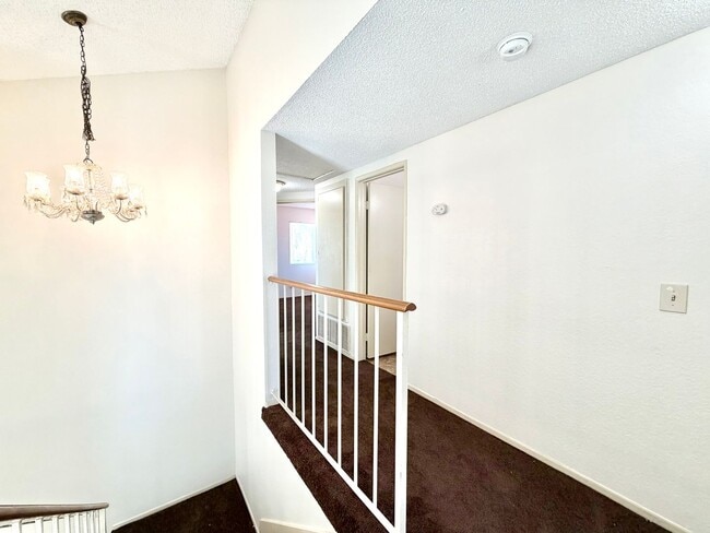 Building Photo - Gated 3 Bedroom 2.5 Bath Home with Bonus Room & Private Balcony