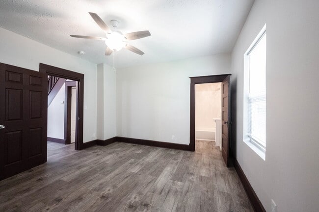 Building Photo - "Spacious 4-Bedroom Gem with 2 Full Baths ...