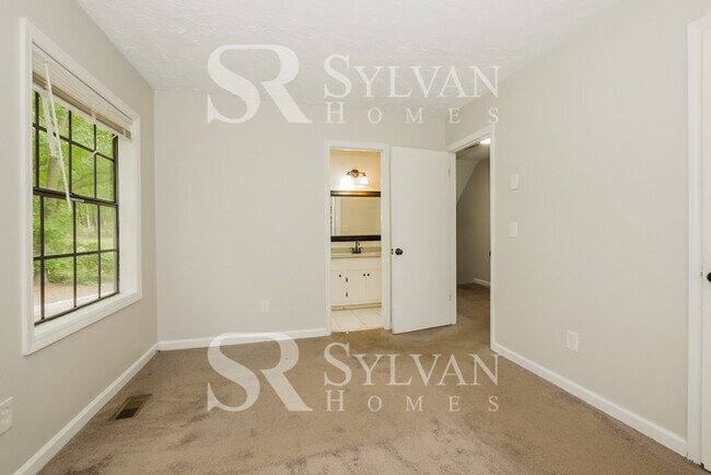 Building Photo - Immerse yourself in comfort and convenience