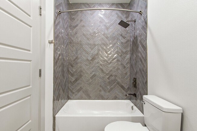 Building Photo - * MOVE IN SUMMER 7/31/2027 * 5 Bed 5.5 Bath Lubbock 1 Block to The TCU Neeley Building