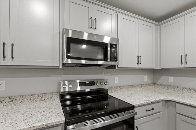 Building Photo - "Brand-New Townhome Awaits!"