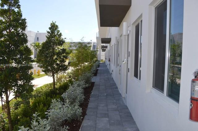 Building Photo - 6416 NW 102nd Ct