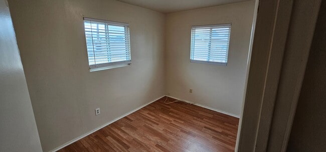 Building Photo - Live Large in a Cozy Retreat! Private Back...