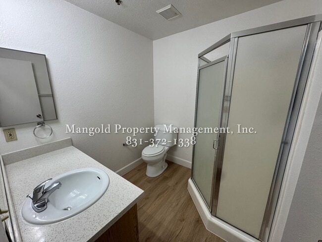 Building Photo - Spacious 2-Bed, 2-Bath Condo with Fireplac...