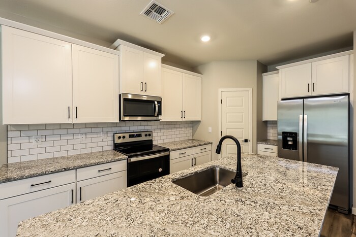 Building Photo - 11491 W Camden Dr