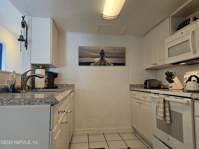 Building Photo - 4302 Seagate Ln N