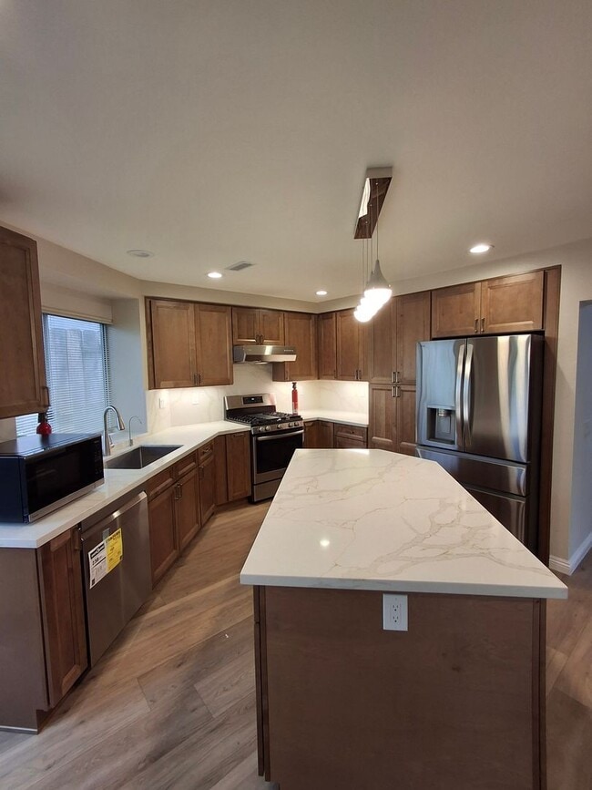 Building Photo - Beautifully Remodeled 4-Bedroom, 3-Bath w/ 2 Car-Garage and Central AC/Heat! MUST SEE!!!