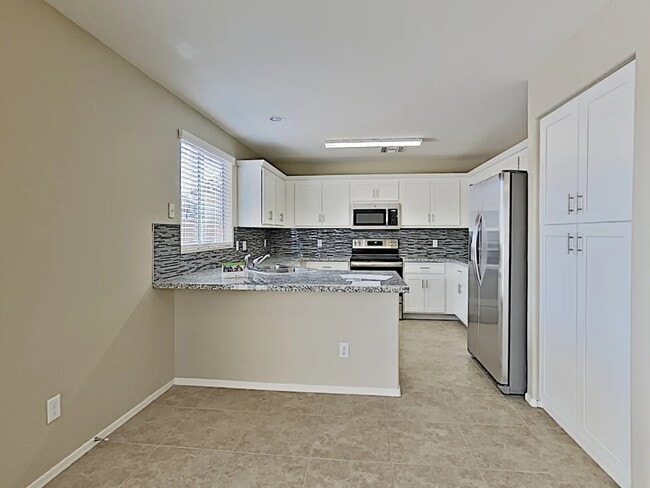 Building Photo - 11826 W Laurel Ln